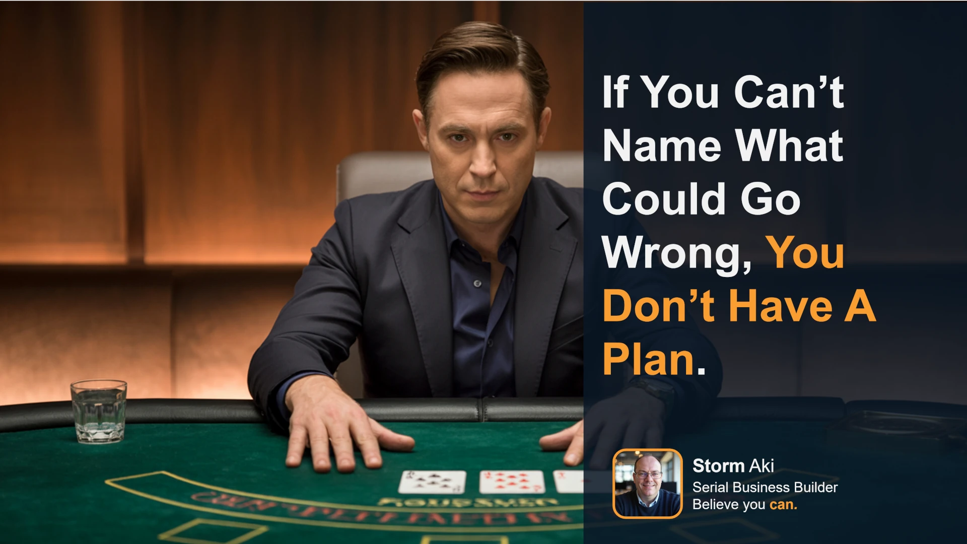 Man sitting at a blackjack table in a suit, staring into the camera and calculating everything that could go wrong