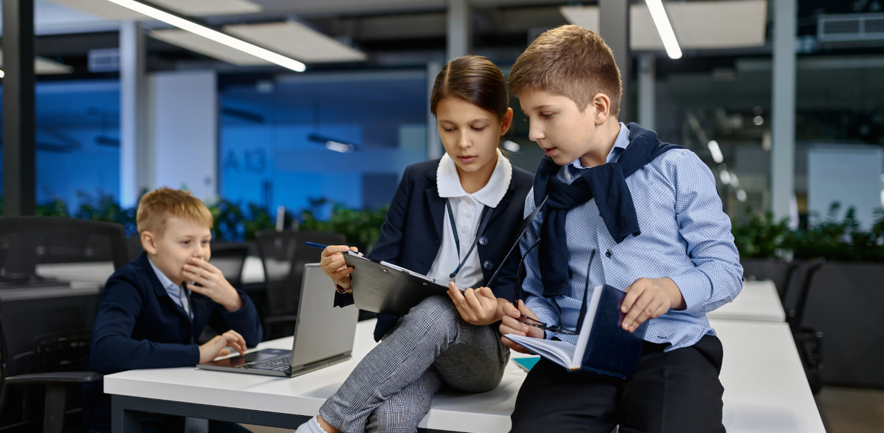 Children pretending to work in an office